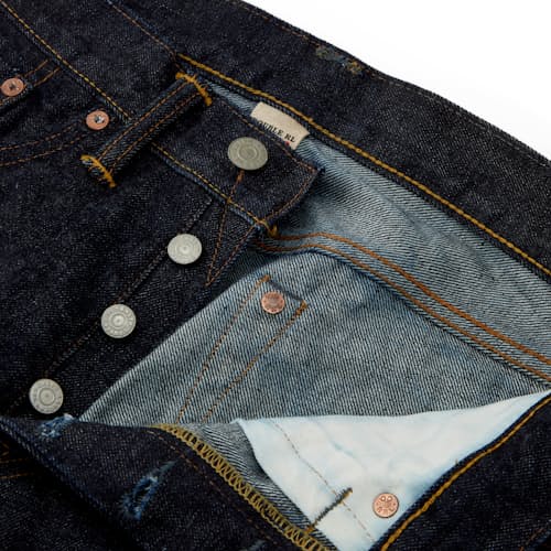 lifestyle image of Slim Fit Selvedge Denim Jeans