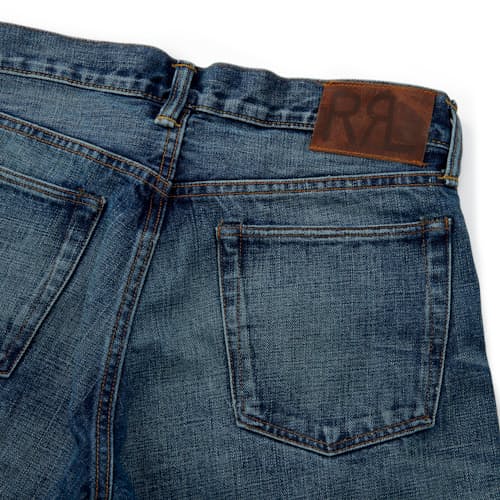 lifestyle image of Slim Fit Selvedge Denim Jeans