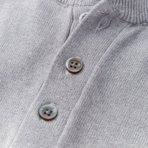 lifestyle image of Cotton Cashmere Henley Sweater