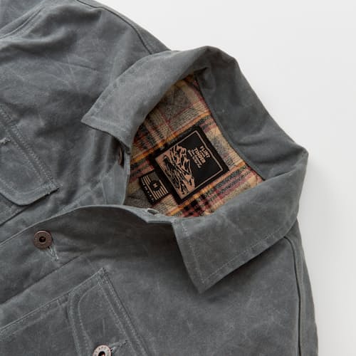 lifestyle image of Flannel-Lined Quilted Waxed Rancher