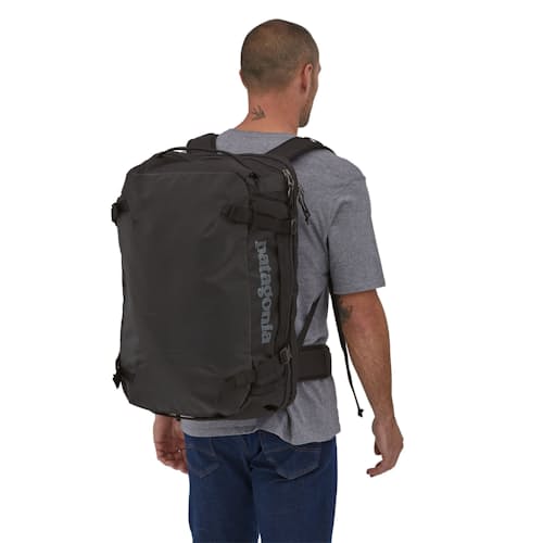 on model image of Black Hole MLC Travel Backpack - 45L