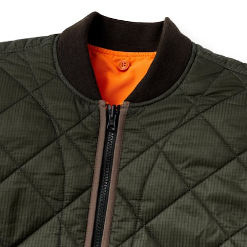 laydown image of Reversible Insulated Eagle Plains Jacket
