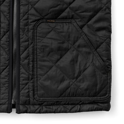 laydown image of Reversible Insulated Eagle Plains Vest