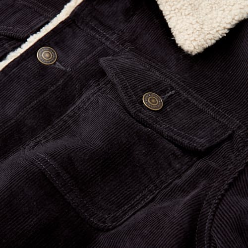 lifestyle image of Boise Corduroy Sherpa Trucker Jacket
