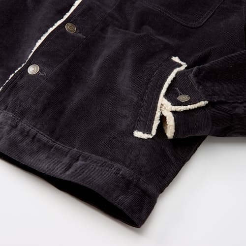 lifestyle image of Boise Corduroy Sherpa Trucker Jacket