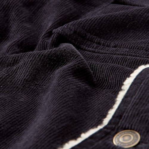 lifestyle image of Boise Corduroy Sherpa Trucker Jacket