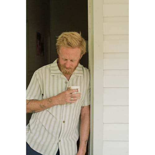 lifestyle image of Vacation Sriped Short Sleeve Shirt
