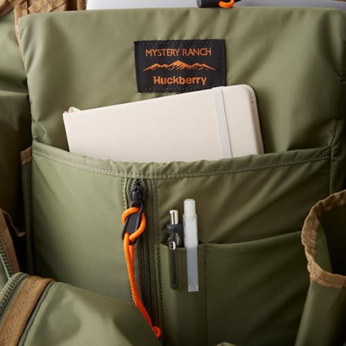 lifestyle image of Huckberry X Mystery Ranch Greenbelt Hybrid Backpack - 30L