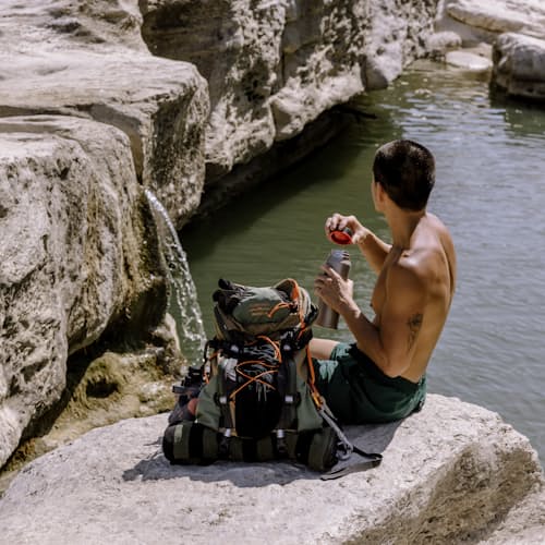 lifestyle image of Huckberry X Mystery Ranch Greenbelt Hybrid Backpack - 30L