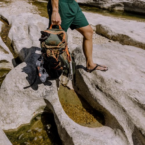 lifestyle image of Huckberry X Mystery Ranch Greenbelt Hybrid Backpack - 30L