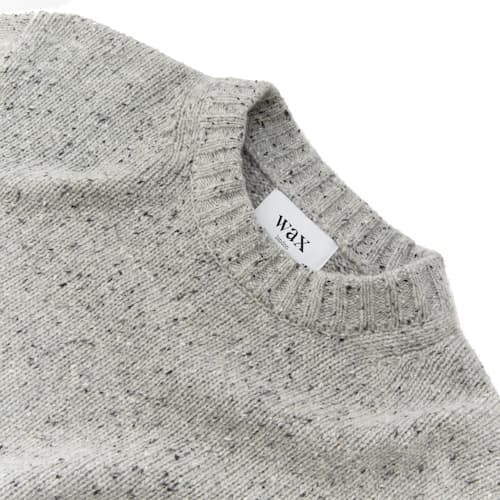 laydown image of Wilde Crew Donegal Merino Wool Sweater