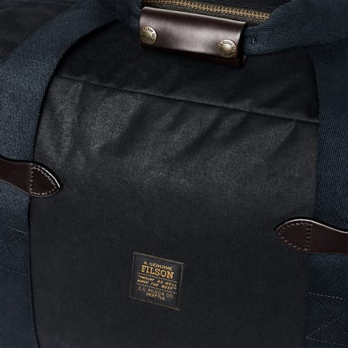 laydown detail image of Tin Cloth Medium Duffel Bag - 43L