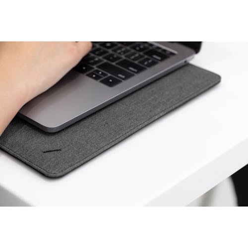 lifestyle image of Stow Slim Sleeve for Macbook