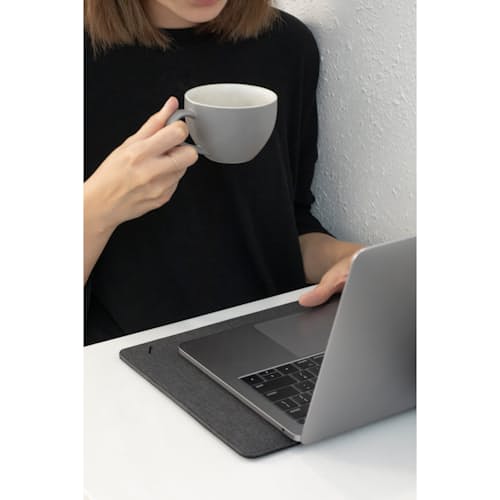 lifestyle image of Stow Slim Sleeve for Macbook