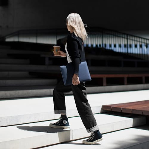 lifestyle image of Stow Slim Sleeve for Macbook