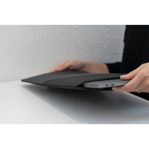 lifestyle image of Stow Slim Sleeve for Macbook