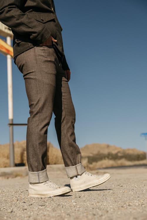 lifestyle image of The Pen Slim Stretch Selvedge Denim Jeans