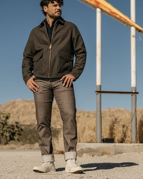 lifestyle image of The Pen Slim Stretch Selvedge Denim Jeans