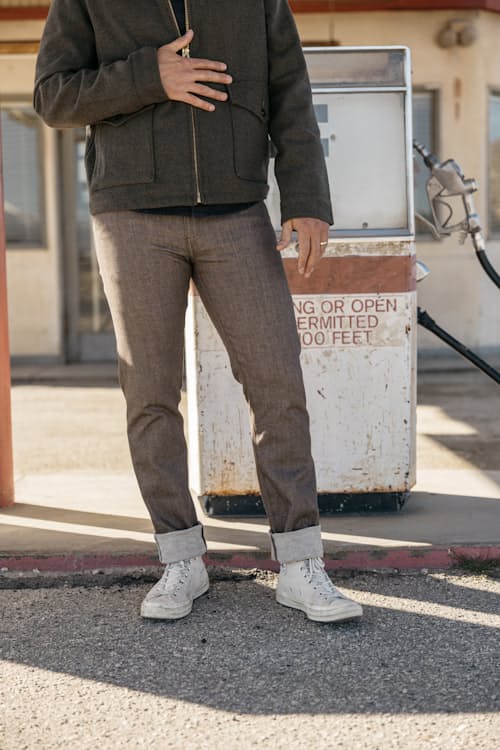 lifestyle image of The Pen Slim Stretch Selvedge Denim Jeans