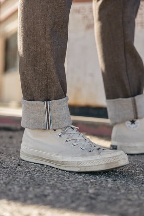lifestyle image of The Pen Slim Stretch Selvedge Denim Jeans