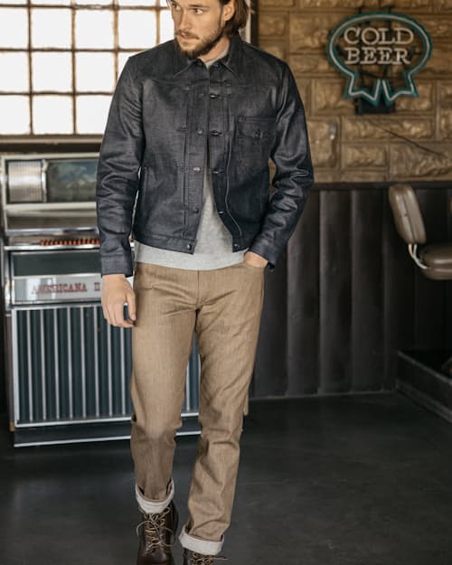 lifestyle image of The Pen Slim Stretch Selvedge Denim Jeans