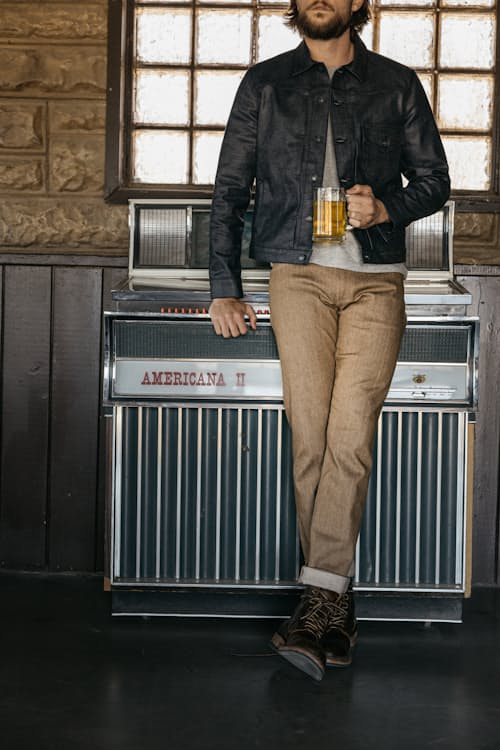 lifestyle image of The Pen Slim Stretch Selvedge Denim Jeans
