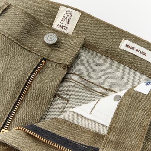 laydown detail image of The Pen Slim Stretch Selvedge Denim Jeans
