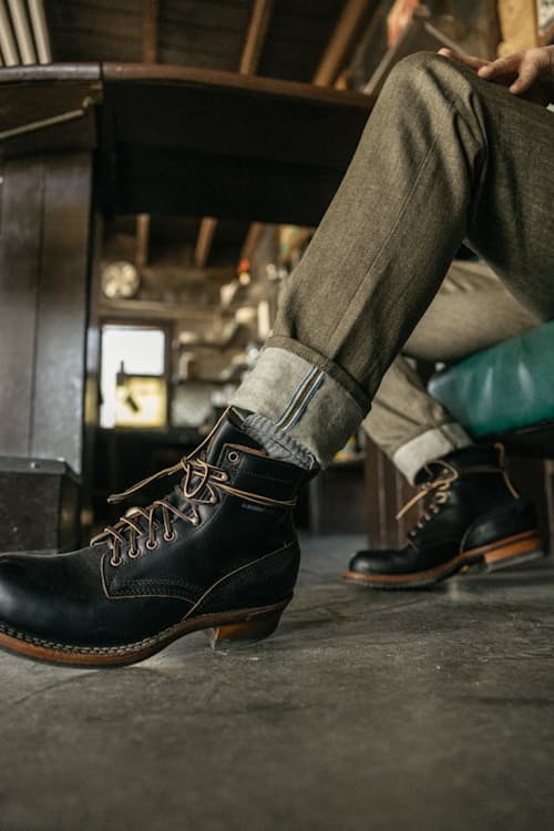 lifestyle image of The Pen Slim Stretch Selvedge Denim Jeans