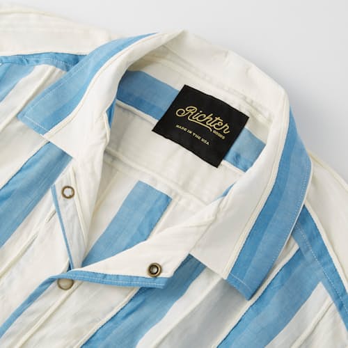 laydown detail image of Striped Pearl Snap Shirt