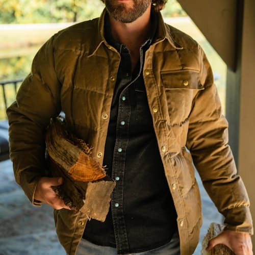 lifestyle image of Huckberry x Thomas Rhett Waxed Canvas Puffer Jacket