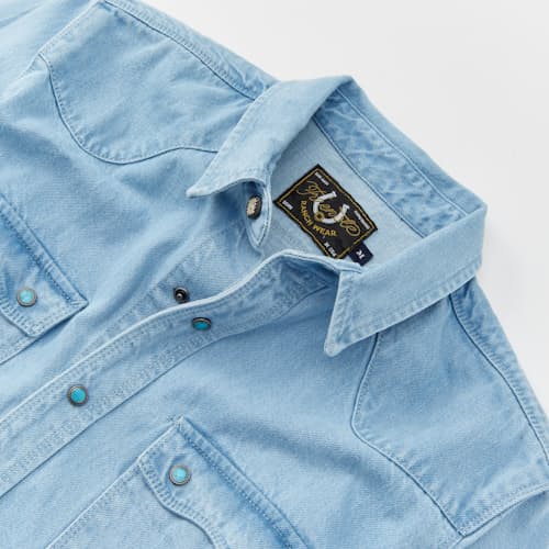 lifestyle image of Western Turquoise Pearlsnap Selvedge Denim Shirt