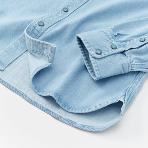 lifestyle image of Western Turquoise Pearlsnap Selvedge Denim Shirt