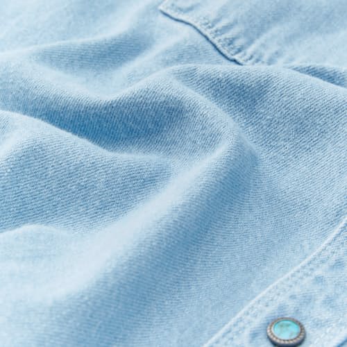 lifestyle image of Western Turquoise Pearlsnap Selvedge Denim Shirt