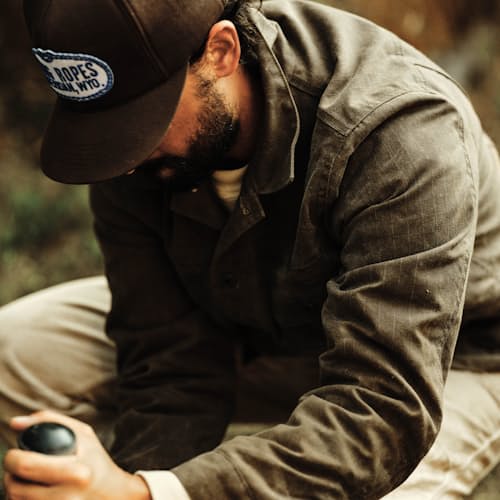 lifestyle image of Flannel-Lined Waxed Ripstop Trucker Jacket - Special Edition