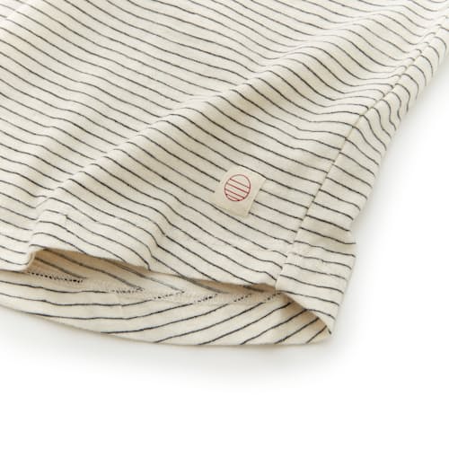 laydown image of Saddle Hem Pocket Tee