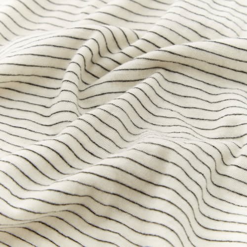 laydown image of Saddle Hem Pocket Tee
