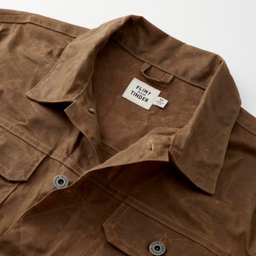 lifestyle image of Unlined Waxed Trucker Jacket
