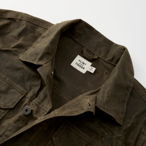 laydown image of Unlined Waxed Trucker Jacket