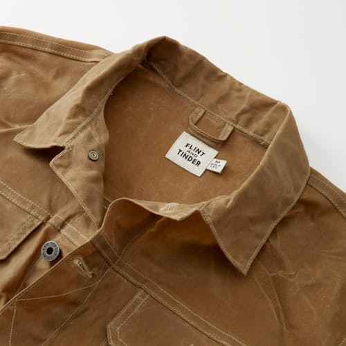 laydown image of Unlined Waxed Trucker Jacket