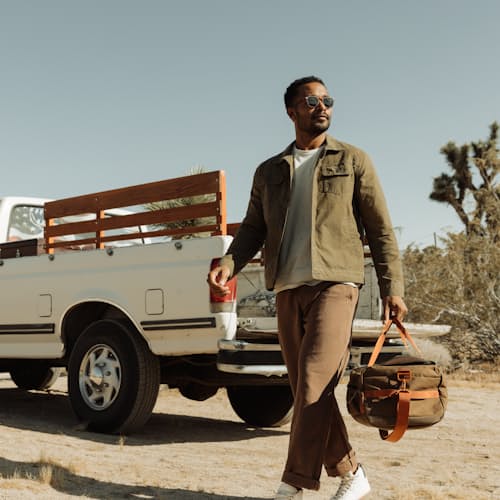 lifestyle image of Unlined Waxed Trucker Jacket
