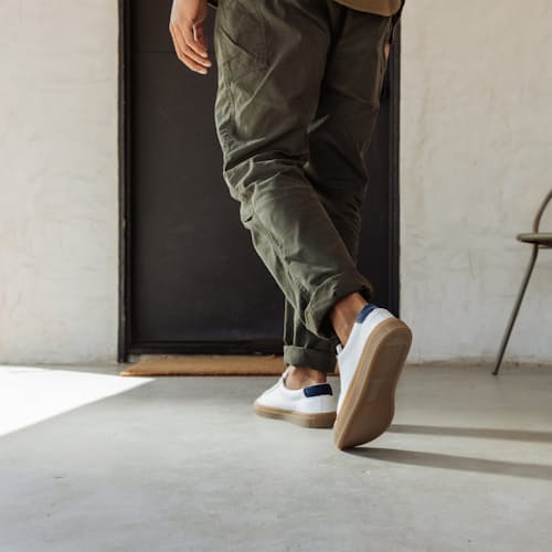 lifestyle image of Huckberry x Opie Way James Low Court Sneaker