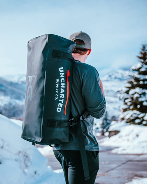 lifestyle image of The Vault Waterproof Adventure Duffel Bag