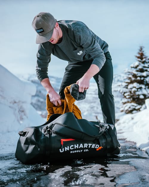 lifestyle image of The Vault Waterproof Adventure Duffel Bag