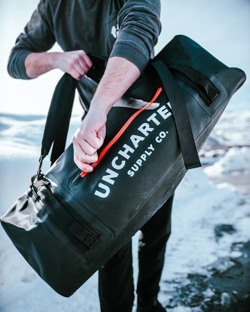lifestyle image of The Vault Waterproof Adventure Duffel Bag