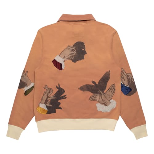 laydown image of Puppet Quarter Zip Sweater