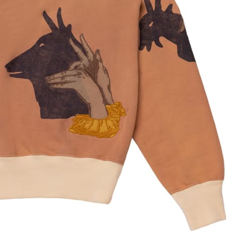 lifestyle image of Puppet Quarter Zip Sweater