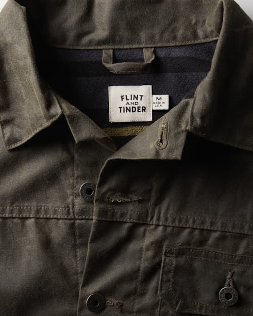 laydown detail image of Women's Flannel-Lined Waxed Trucker Jacket