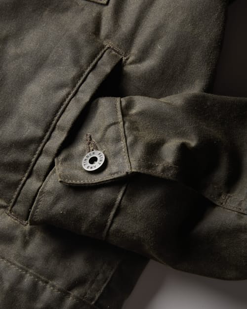 laydown detail image of Women's Flannel-Lined Waxed Trucker Jacket