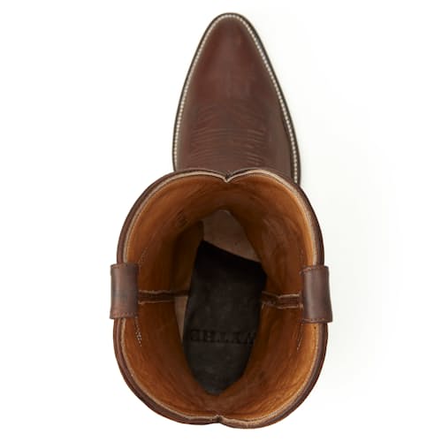 laydown image of Huckberry x Wythe Leather Western Boot