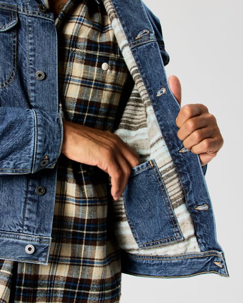 on model image of Flannel-Lined Denim Trucker Jacket